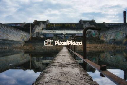 Abandoned Soviet-Era Palace - Decaying Structure Reflected in Water